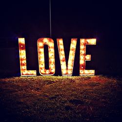 Text written on field at night