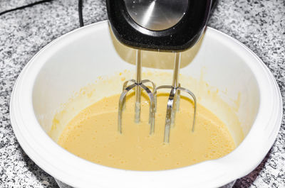 Close-up of electric mixer and bowl