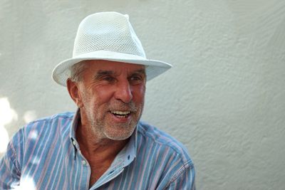 Portrait of smiling man wearing hat