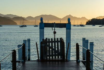 Pier over sea against sky