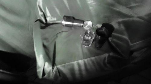 Close-up of hand holding eyeglasses