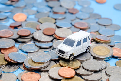 High angle view of coins on table