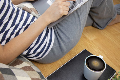 High angle view of man sitting at home