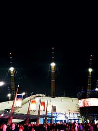 Crowd on illuminated city at night