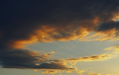 Low angle view of dramatic sky during sunset