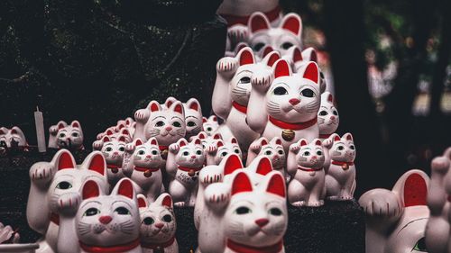 Close-up of cat statues