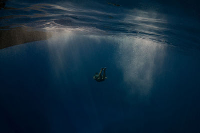 View of person swimming in sea