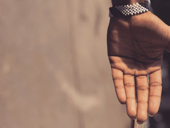 Close-up of hand holding hands