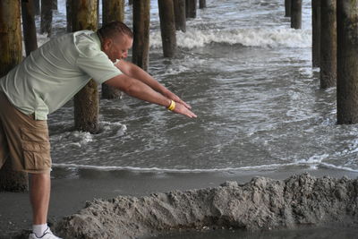 Boy playing in sea