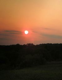 Scenic view of landscape at sunset