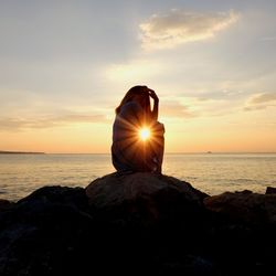 Scenic view of sea against sky during sunset