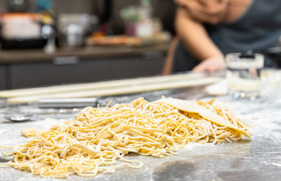 Midsection of man preparing food