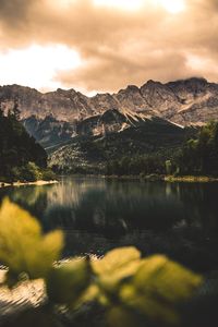 Scenic view of lake against sky during sunset