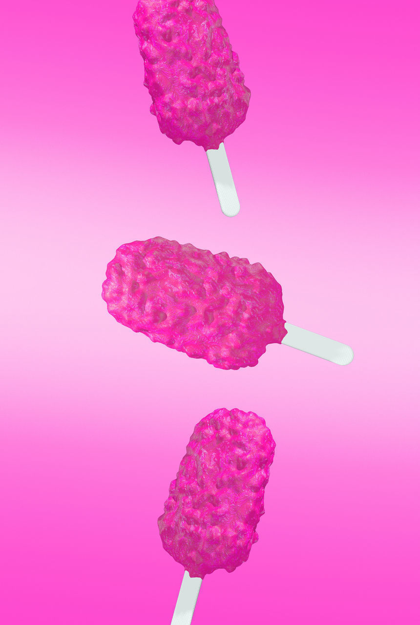 CLOSE-UP OF ICE CREAM ON PINK BACKGROUND