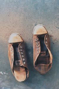 High angle view of shoes on sand