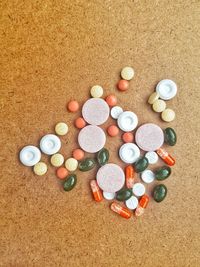 High angle view of multi colored pebbles on sand