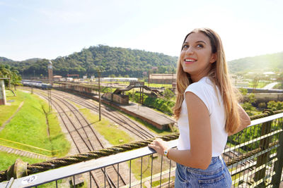 Beautiful tourist girl visiting historic abandoned village of paranapiacaba, sao paulo, brazil