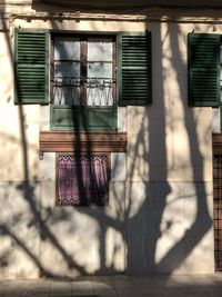 Close-up of clothes drying against building