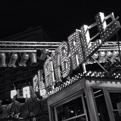 Low angle view of illuminated building at night