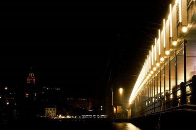 View of illuminated city at night