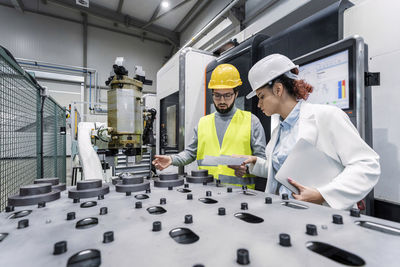 Portrait of scientist working in factory