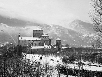 Scenic view of mountains against sky during winter