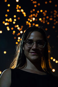 Portrait of young woman wearing eyeglasses
