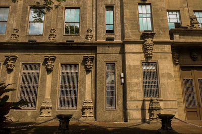 Statue in front of historical building