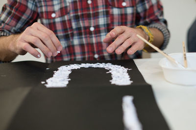 Cropped image of woman holding hands