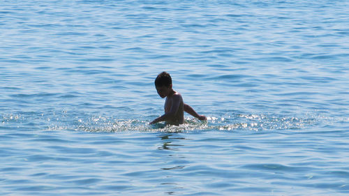 Full length of woman in swimming pool