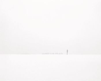 Scenic view of sea against sky during winter