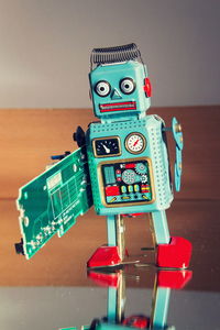 Close-up of robot on table