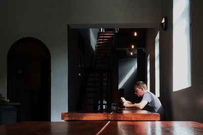 Young man sitting in office