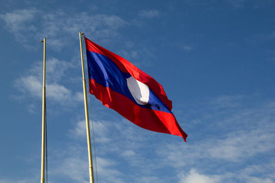 Low angle view of flag against sky