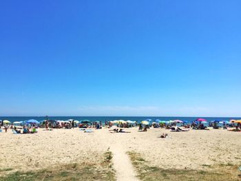 Scenic view of beach against clear sky