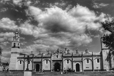 View of historic building against cloudy sky