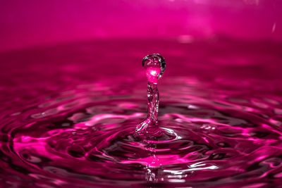 Close-up of drop splashing in water