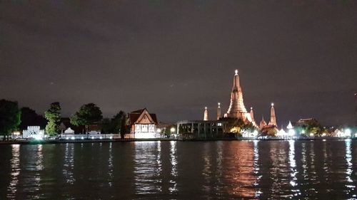 View of illuminated mosque at night