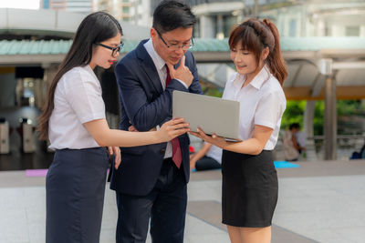 Young woman using mobile phone