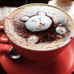 Close-up of cappuccino on table