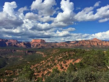 Scenic view of landscape against cloudy sky