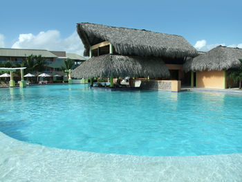 View of swimming pool with buildings in background