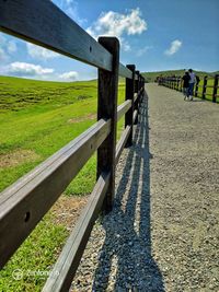 Road passing through field