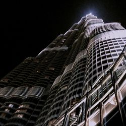 Low angle view of skyscrapers at night