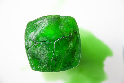 Close-up of wet leaf against white background