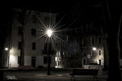 Illuminated street light at night