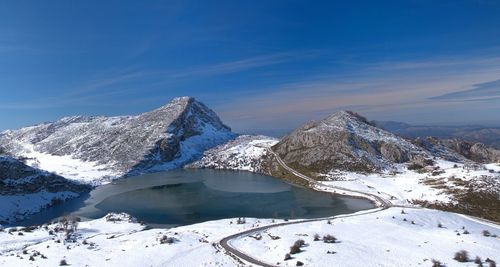 Scenic view of snowcapped mountains against sky