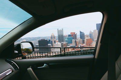 Cityscape seen through car window