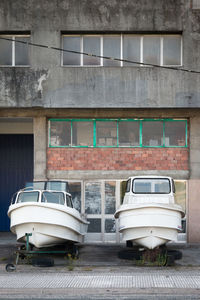 View of abandoned boats on street