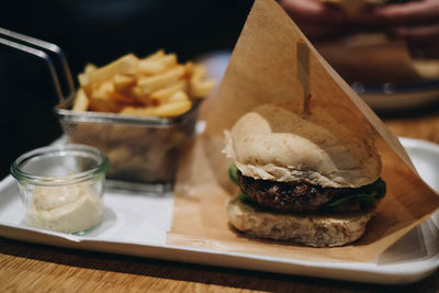 Close-up of burger in tray on table